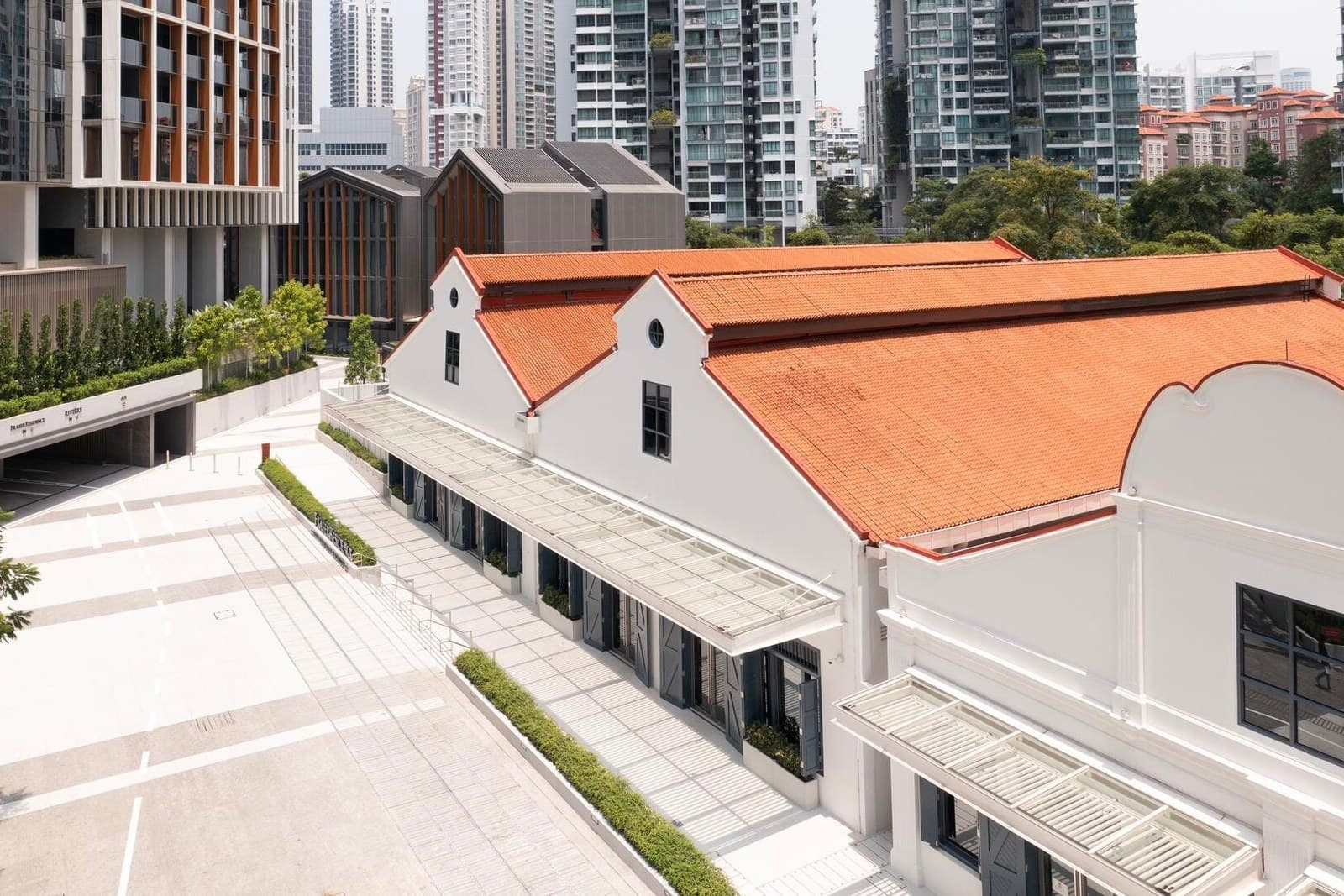 Rivière at Jiak Kim Street, completed by Frasers Property in 2023 Rivière at Jiak Kim Street, its conserved warehouses with orange tiled roofs below the residential towers